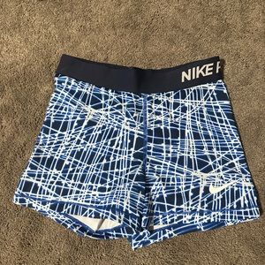 Blue Nike compression shorts